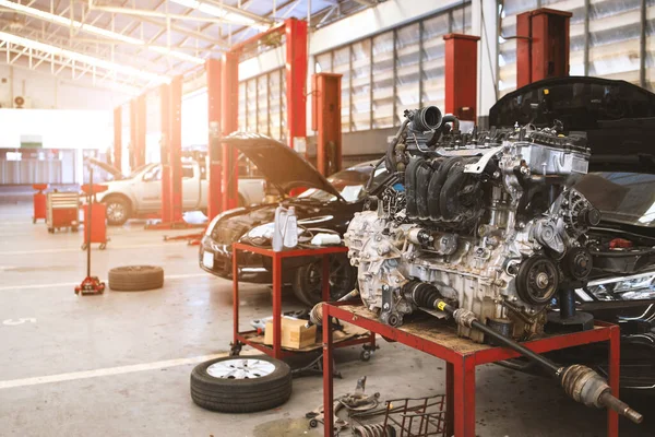 depositphotos_449005472-stock-photo-mechanic-working-car-maintenance-soft